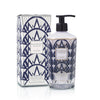 Baobab Collection Manhattan body and hand lotion in decorative glass bottle with navy blue design.