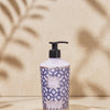 Baobab Collection Gentlemen body and hand lotion 350ml with geometric navy blue print on elegant display.