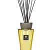 Baobab Collection's Totem Aurum fragrance diffuser with gold vase and ceramic cap, featuring black sticks for home decor.